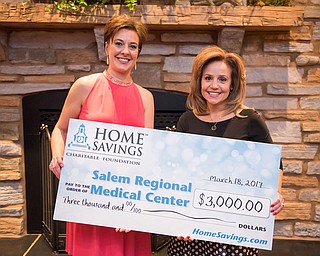 SPECIAL TO THE VINDICATOR
Julie Needs, left, Home Savings AVP/branch manager, presented a $3,000 sponsorship check to Anita Hackstedde, M.D., president and CEO of Salem Regional Medical Center, at the seventh annual Hearts & Stars Gala.