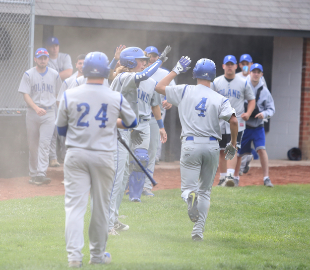 Poland's Braeden O'Shaughnessy(4) celebrates after a run during the 1st inning as Poland High School takes on Canfield High School, Tuesday, March 25, 2017 at Phil Bova Field. Poland won 9-1...(Nikos Frazier | The Vindicator)..