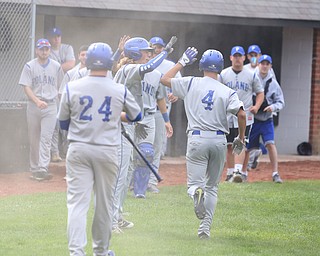 Poland's Braeden O'Shaughnessy(4) celebrates after a run during the 1st inning as Poland High School takes on Canfield High School, Tuesday, March 25, 2017 at Phil Bova Field. Poland won 9-1...(Nikos Frazier | The Vindicator)..