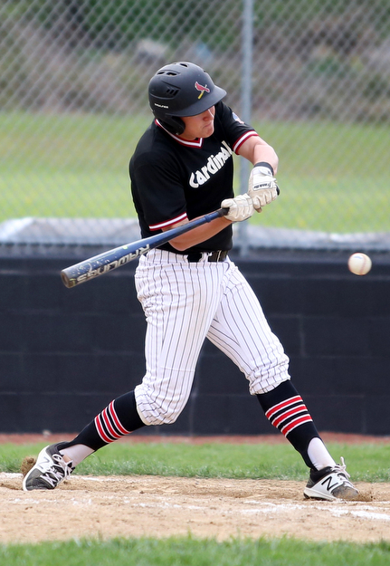 Canfield's Anthony Vross(24) swings during the 1st inning as Poland High School takes on Canfield High School, Tuesday, March 25, 2017 at Phil Bova Field. Poland won 9-1...(Nikos Frazier | The Vindicator)..