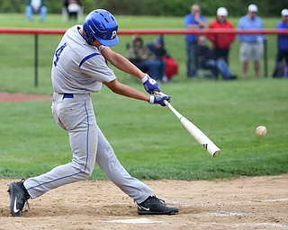 Poland's Braeden O'Shaughnessy(4) swings during the 4th inning as Poland High School takes on Canfield High School, Tuesday, March 25, 2017 at Phil Bova Field. Poland won 9-1...(Nikos Frazier | The Vindicator)..