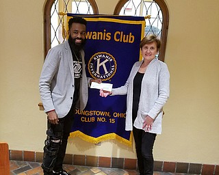 SPECIAL TO THE VINDICATOR
The Kiwanis Club of Youngstown donated $1,000 to the Boys & Girls Club of Youngstown at its March 24 meeting. Germaine McAlpine, left, executive director and CEO of the Boys & Girls Club, received the check from Carla Hunter, president of Kiwanis. The Boys & Girls Club works with young people with a focus on helping those struggling with economic, social and family issues. Kiwanis is celebrating its 100th year. Its mission is to serve children around the world. Kiwanis members volunteer and donate to various organizations throughout the year. The Kiwanis Club meets at noon every Friday at the YMCA, 17 N. Champion St., Youngstown. Guests are welcome. For information, call Chris McCarty at 330-729-1017, or 310-948-8858.
