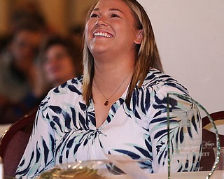 MICHAEL G TAYLOR | THE VINDICATOR- 04-26-17 Youngstown State University (YSU)  Scholar-Athlete Banquet at The Georgetown in Boardman, OH.  The Female Athlete of the Year Jaynee Corbett smiles during her Assistant Track and Field Coach (Throws) John Seaver presentation speech.