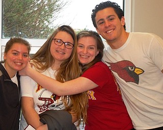 Neighbors | Submitted.Cardinal Mooney High School Hospitality team members worked as group leaders showing the .fifth- and six-grade students around during the day on March 31. Pictured are, from left, Alexis Santor, Lauren Markovich, Kate Pelini and Marco Divincenzo.