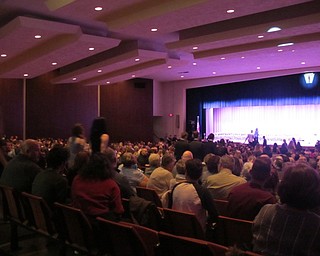 Neighbors | Alexis Bartolomucci.Current Austintown Fitch National Honor Society members walked down the aisle as they took the stage for the NHS Ceremony on April 7.