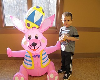 Neighbors | Alexis Bartolomucci.Damian posed with the inflatable Easter Bunny during the Dinner with the Easter Bunny on April 5 at Boardman Park.