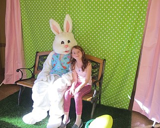 Neighbors | Alexis Bartolomucci.Kelsey McCallum took a picture with the Easter Bunny during the Dinner with the Easter Bunny at Boardman Park on April 5.