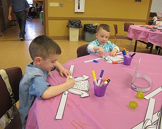 Neighbors | Alexis Bartolomucci.Landon Marsh and Maceo Bannon colored a set of bunny ears to wear during the Dinner with the Easter Bunny on April 5 at Boardman Park.
