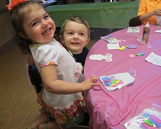 Neighbors | Alexis Bartolomucci.Mia Acevedo and Rocco Turk put together on Easter Bunny as a craft during the Dinner with the Easter Bunny at Boardman Park on April 5.