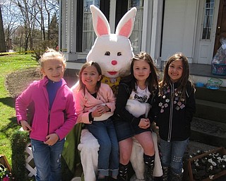 Neighbors | Alexis Bartolomucci.Kylie Oles, Gabriella Navarro, Olivia Navarro and Cassidy Carlson took a picture with the Easter Bunny during the Poland Junior Women's Club Easter Egg Hunt on April 8.