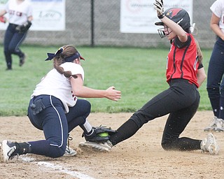 William d Lewis the vindicator  Canfield's Maura Kennedy(1) is tagged out at 3rd by  Fitch's Lainie Simons(5) during 4-28-17 game with Fitch.