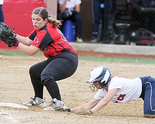 William d Lewis the vindicator  Fitch's Kayla Kelty(1) gets back to first as Canfield's Jenna Gibson (15) tries to make the tag during 4-28-17 game .