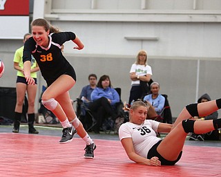 Pittsburgh Elite's Molly Scotti(38) runs for the ball after Alexa Mamone(36) hit the ball while diving backwards as Pittsburgh Elite 17 Premier 2 takes on Lakeside Launch in the 17-18 club during the Rust Belt Challenge volleyball tournament at Watson and Tressel Training Site at YSU, Saturday, April 29, 2017 in Youngstown. Lakeside Launch won, 25-16, 16-25, 18-16...(Nikos Frazier | The Vindicator)..