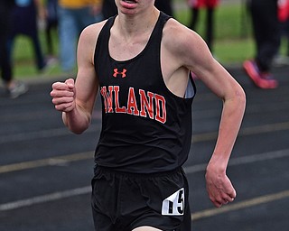 POLAND, OHIO - APRIL 29, 2017: Howland's Vincent Mauri sprints to the finish line on the last lap of the boys 3200 meter run, Saturday morning during the Poland Invitational at Poland High School. DAVID DERMER | THE VINDICATOR