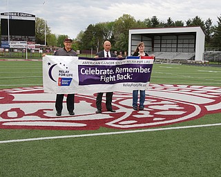        ROBERT K. YOSAY  | THE VINDICATO..Boardman Relay for Life kickoff- this year at the High School Stadium.. complete with fireworks.Frank Lazzeri -  Tim Saxton and Stephanie Shelton with ACS
