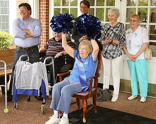        ROBERT K. YOSAY  | THE VINDICATO..Queen of Poland Sara Hill..cheers along.. with the students.. Poland Seminary High School students - band Cheerleaders and foorball palyers put on a surprise pep rally/parade for a Shepherd of the Valley resident with strong Poland pride..