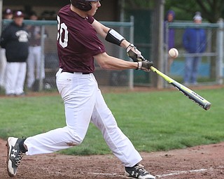 Boardman batter Coleman Stauffer(20) swings during the 3rd inning as Boardman takes on Poland, Tuesday, May 2, 2017 at Cene Park. ..(Nikos Frazier | The Vindicator)..