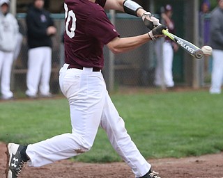 Boardman batter Coleman Stauffer(20) swings during the 3rd inning as Boardman takes on Poland, Tuesday, May 2, 2017 at Cene Park. ..(Nikos Frazier | The Vindicator)..