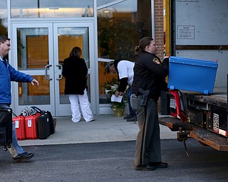 Deputy Stephanie Harchar(right) loads a ballot box into the Board of Elections box truck as Nick Sharpe follows with more at St. Christine Parish Center, Tuesday, May 2, 2017 in Youngstown. ..(Nikos Frazier | The Vindicator)..