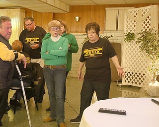 ROBERT K. YOSAY | THE VINDICATOR..anthony sertick and friends listen to results on TV - as he never over came the lead from the absentee ballots.