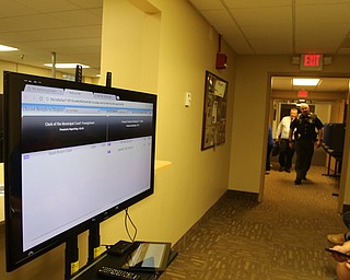        ROBERT K. YOSAY  | THE VINDICATOR..The new scrolling precinct results software - as it starts its first night at Election HQ at Mahoning County Board of Elections.