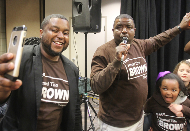 William D. Lewis the vindicator  Tito Brown reacts to news he won mayoral primary.  At left is his son Aaron.