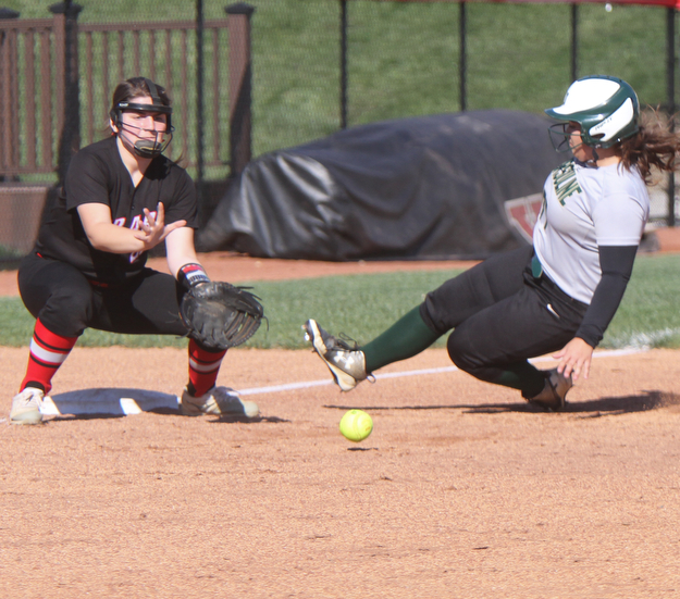 William D. Lewis the Vindicator Ursuline Gia Caldrone(77) is safe at 3rd as Girard's Jessica Dohry(25)  waits for the throw during 5-3-17 win over Girard..