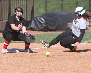 William D. Lewis the Vindicator Ursuline Gia Caldrone(77) is safe at 3rd as Girard's Jessica Dohry(25)  waits for the throw during 5-3-17 win over Girard..