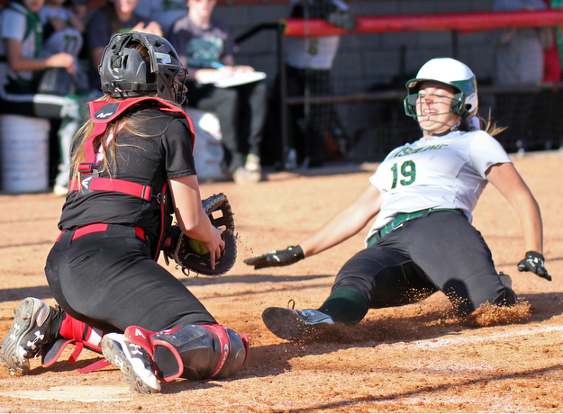 William D. Lewis the Vindicator Ursuline's Jenna O'Hara(19) is out at the plate as Girard catcher Hanna Jones makes the play during 5-3-17 win over Girard..