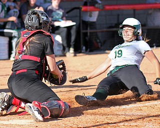 William D. Lewis the Vindicator Ursuline's Jenna O'Hara(19) is out at the plate as Girard catcher Hanna Jones makes the play during 5-3-17 win over Girard..