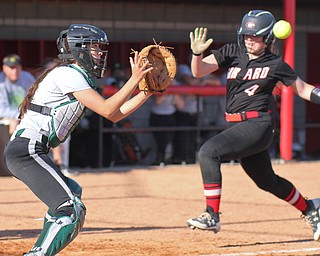 William D. Lewis the Vindicator Girard's Hannah Jones(4) is out at the plate as Uruline catcher Cassie Hanuschak(24) waits for the ball during 5-3-17 game.
