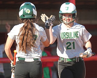 William D. Lewis the Vindicator Ursuline's Cassie Hanuschak(27) gets congrats from Emma Ericson(21) after scoring  during 5-3-17 win over Girard..
