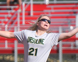 William D. Lewis the Vindicator Ursuline Emma Ericson (21) pulls in a flyball of the ball of Girard's Emily Scarnecchia during 5-3-17 win over Girard..