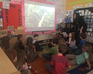 SPECIAL TO THE VINDICATOR
Students in Cinda Lude’s kindergarten class at Joshua Dixon Elementary School in Columbiana recently participated in a virtual African safari through the live-video call program, Skype, hosted by SafariLIVE School Session. A guide in South Africa led the video call by driving a car through brush, looking for wildlife. The class saw warthogs, antelope, a two-foot long water lizard, giraffes and elephants during the 45-minute call. SafariLIVE is free, and is provided by WildEarth, a nonprofit group with the mission of sharing nature experiences with people around the world.