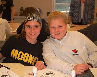 Neighbors | Submitted.Students from Holy Family enjoyed art class during Cardinal Mooney High School's Fifth and Sixth Grade Day on March 31.