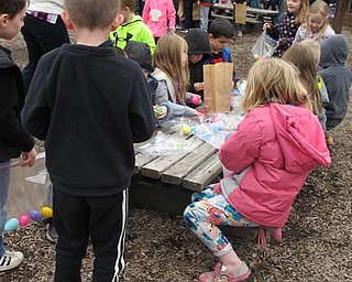 Neighbors | Alexis Bartolomucci.Boardman elementary students looked inside the eggs they found during the Boardman Kiwanis Easter Egg Hunt on April 5 at Boardman Park.
