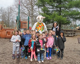 Neighbors | Alexis Bartolomucci.Krista Schmied and her kindergarten class got a picture with the Easter Bunny after they found their eggs at Boardman Park on April 5.
