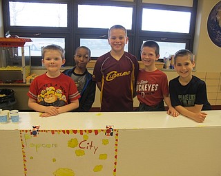 Neighbors | Alexis Bartolomucci.Students worked the popcorn stand at the Carnival of Fun at Stadium Drive Elementary on April 4-7. Pictured are, from left, Lucas, Jordan, Zachary, Thomas and Ben.