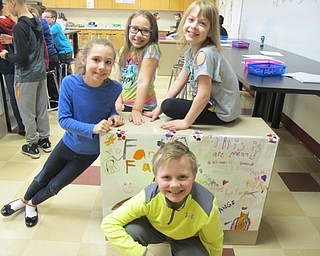 Neighbors | Alexis Bartolomucci.Second-grade students drew caricatures for the guests who came to the Carnival of Fun at Stadium Drive Elementary on April 4-7. Pictured are, from left, (front); Ryan (back) Gianna, Angeline and Nicole.