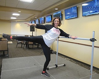 Neighbors | Alexis Bartolomucci.Kim Miller from Barre Youngstown practiced different demonstrations she would be showing during the Youngstown Fitness Expo on May 13.