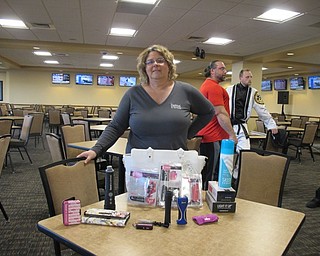 Neighbors | Alexis Bartolomucci.Lori McDonald showed off her Damsel in Defense products she would be selling during the Youngstown Fitness Expo on May 13.