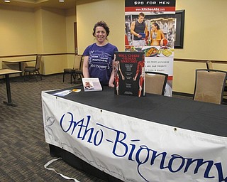 Neighbors | Alexis Bartolomucci.Gina DeAngelo and her Orth-Bionomy table will be set up for people to visit during the Youngstown Fitness Expo on April 13 at the Hollywood Gaming Racino.