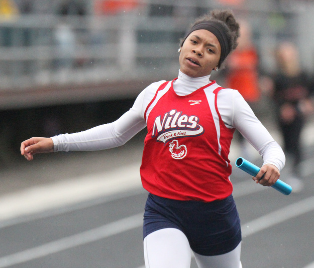 William D Lewis The Vindicator Niles Kyndia Matlock crosses the finish to win in girls 4x200 during Trumbull Track Meet at Lakeview 5-4-17