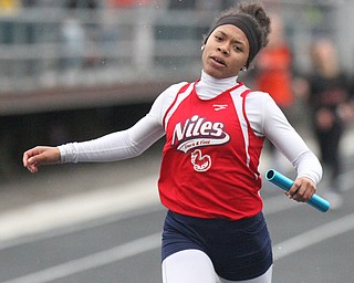William D Lewis The Vindicator Niles Kyndia Matlock crosses the finish to win in girls 4x200 during Trumbull Track Meet at Lakeview 5-4-17
