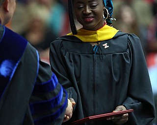 MICHAEL G TAYLOR | THE VINDICATOR- 05-06-17 Youngstown State University (YSU) Commencement at Beeghly Center on YSU campus. Graduate receives her degree.