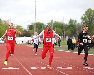 Chad Zallow(429) of Youngstown State crosses the finish line in the Men's 200 meter dash with Carl Zallow(428) of Youngstown State and Joe McCarthy(313) of Oakland during a Horizon League Track and Field Championship at Farmers National Bank Field, Saturday, May 6, 2017 in Youngstown.  ..(Nikos Frazier | The Vindicator)