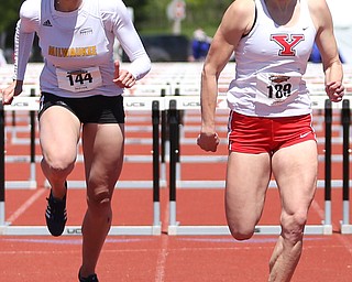 Melissa Kirchoff(144) of Milwaukee and Amber Eles(189) of Youngstown State compete in the women's 100 meter hurdles final during the final day of the Horizon League Track & Field Championships at Farmers National Bank Field at Youngstown State, Sunday, May 7, 2017 in Youngstown. Eles placed 1st with at time of 13.71...(Nikos Frazier | The Vindicator)