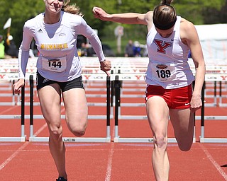 Melissa Kirchoff(144) of Milwaukee and Amber Eles(189) of Youngstown State compete in the women's 100 meter hurdles final during the final day of the Horizon League Track & Field Championships at Farmers National Bank Field at Youngstown State, Sunday, May 7, 2017 in Youngstown. Eles placed 1st with at time of 13.71...(Nikos Frazier | The Vindicator)