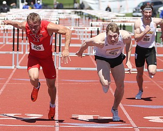 Chad Zallow(429) of Youngstown State and Nate Pozolinski(384) of Milwaukee, compete in the men's 110 meter hurdle final during the final day of the Horizon League Track & Field Championships at Farmers National Bank Field at Youngstown State, Sunday, May 7, 2017 in Youngstown.  Zallow placed first with a time of 13.782. ..(Nikos Frazier | The Vindicator)