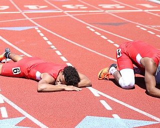 Collin Harden(403) and Caleb Lloyd(407)(left) of Youngstown State, competes in the men's 400 meter hurdles final during the final day of the Horizon League Track & Field Championships at Farmers National Bank Field at Youngstown State, Sunday, May 7, 2017 in Youngstown.  Harden placed first with a time of 52.03...(Nikos Frazier | The Vindicator)